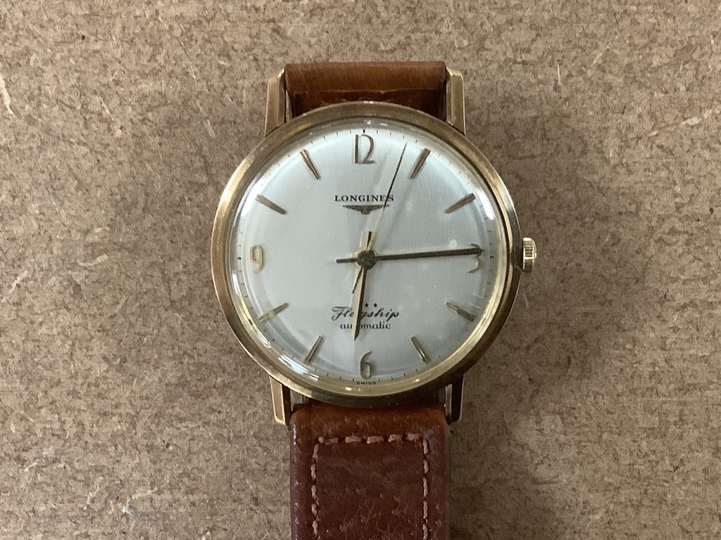 A gentleman's 9ct gold Longines Flagship automatic wristwatch, on a leather strap, with Longines box, case diameter 36mm, excluding crown, gross 36.8 grams.